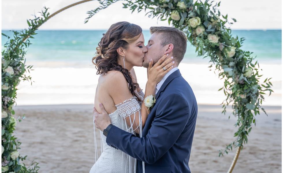 A bride and groom kissing