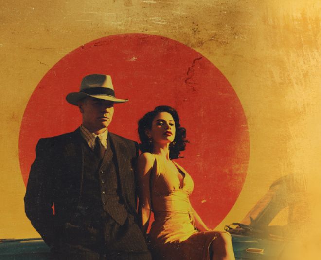 couple dressed as 1960's mobsters