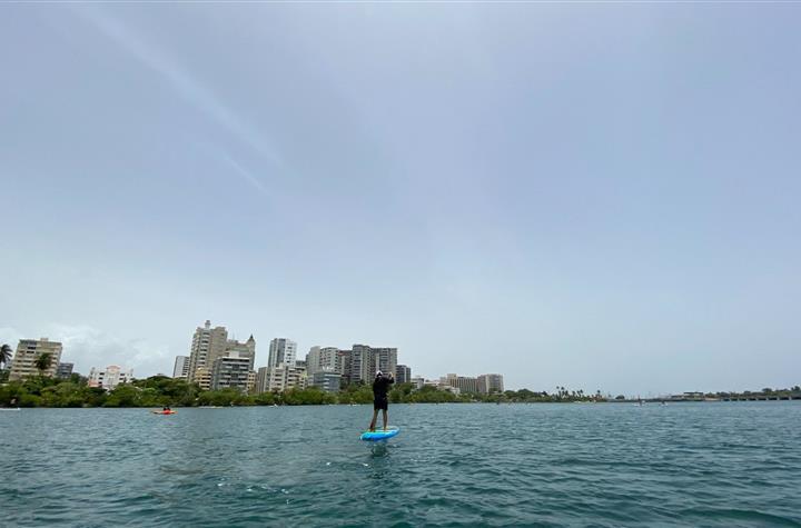 Someone paddleboarding