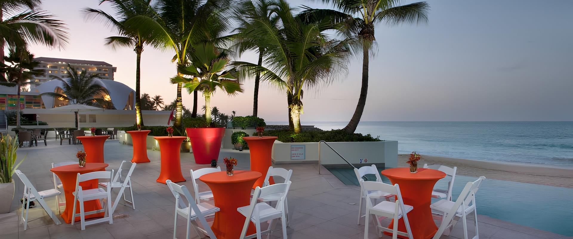 Tables and Chairs next to the beach