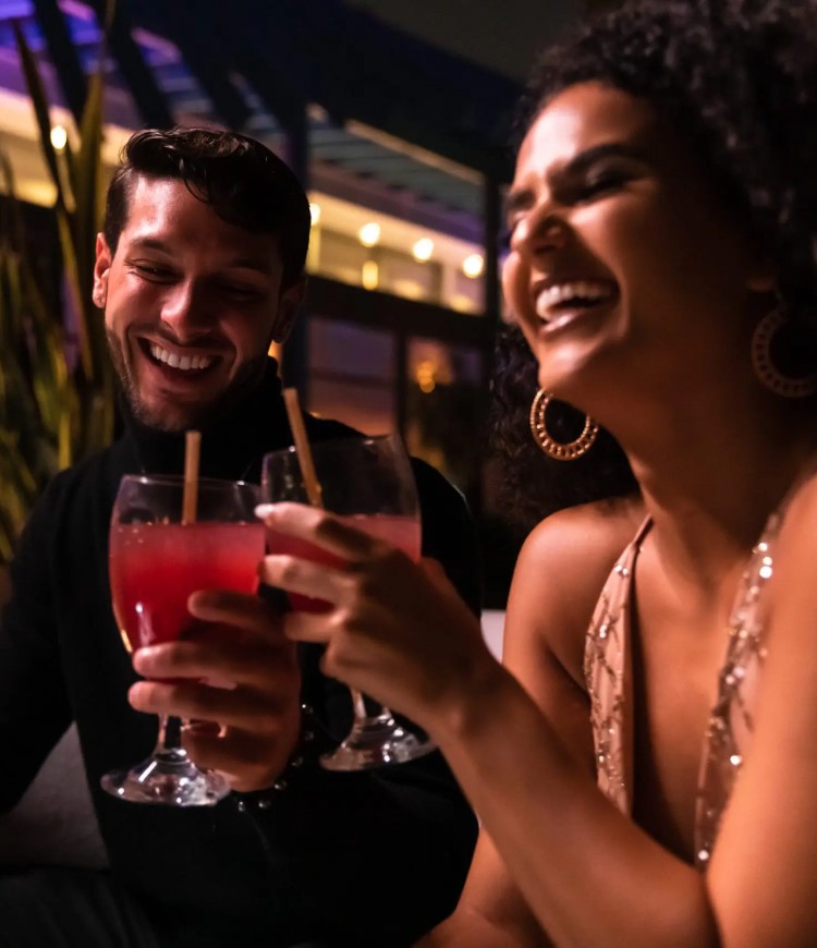 couple drinking sangrias at la concha hotel san juan