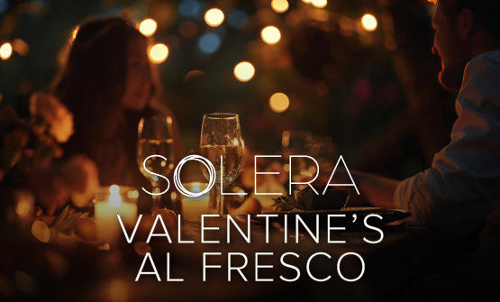 Solera Valentine's dinner at la concha resort. image of two people dining at night.